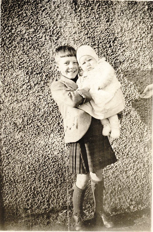 Iain Pender holding Burnett Pender, ca. 1932